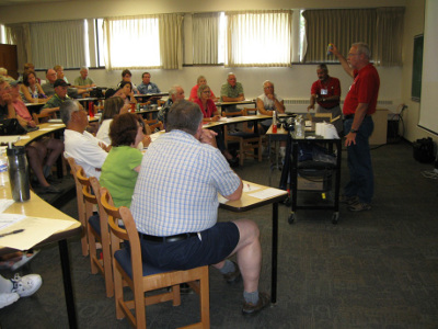 John and KC presenting in a classroom RV Lifestyle Seminar
